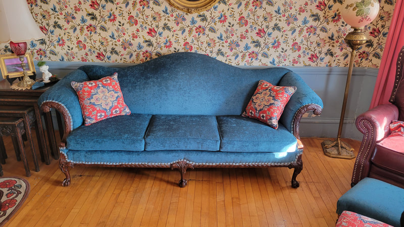 Antique Sofa - After photo of compete restoration and  Reupholstering by Landry Home Decorating